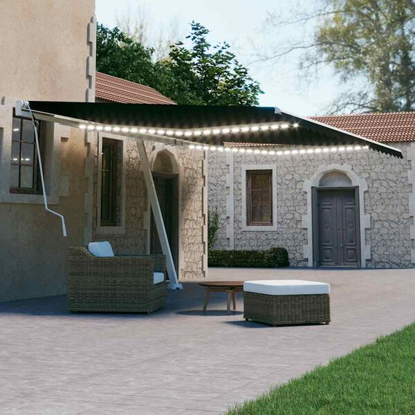 vidaXL Toldo retrátil manual com LED 600x300 cm antracite