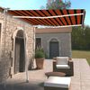 vidaXL Toldo retr&aacute;til manual com LED 300x250 cm laranja e castanho