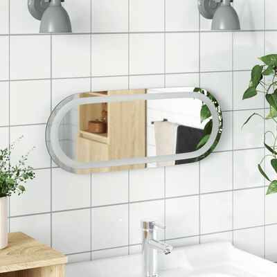 vidaXL Espelho de casa de banho com luzes LED oval 50x20 cm