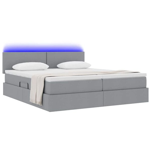 vidaXL Cama com luzes de tira LED Cinzento-claro 180 x 200 cm tecido