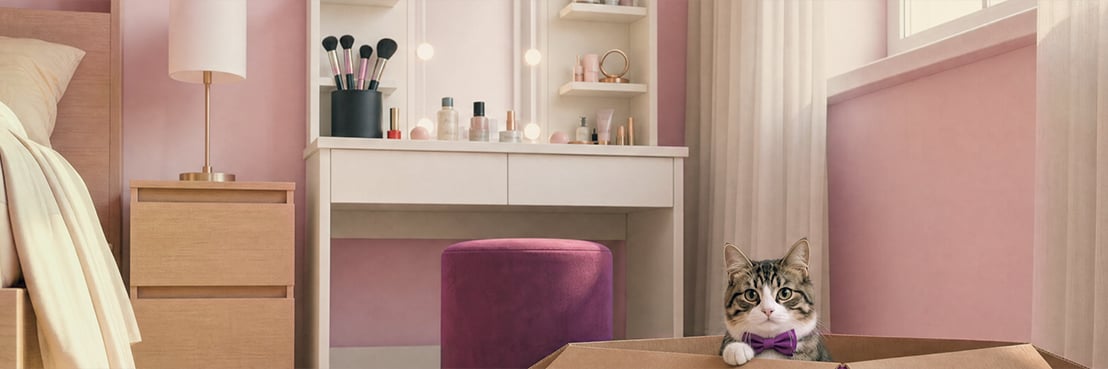 Gato a espreitar de uma caixa vidaXL num quarto com toucador e gavetas de arrumação.