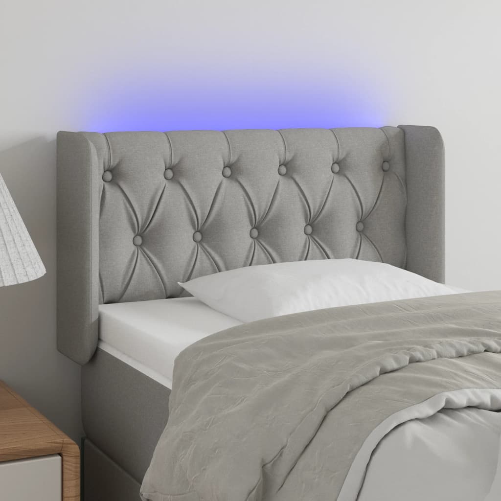 vidaXL Cabeceira de cama c/ luzes LED tecido 83x16x78/88cm cinza-claro